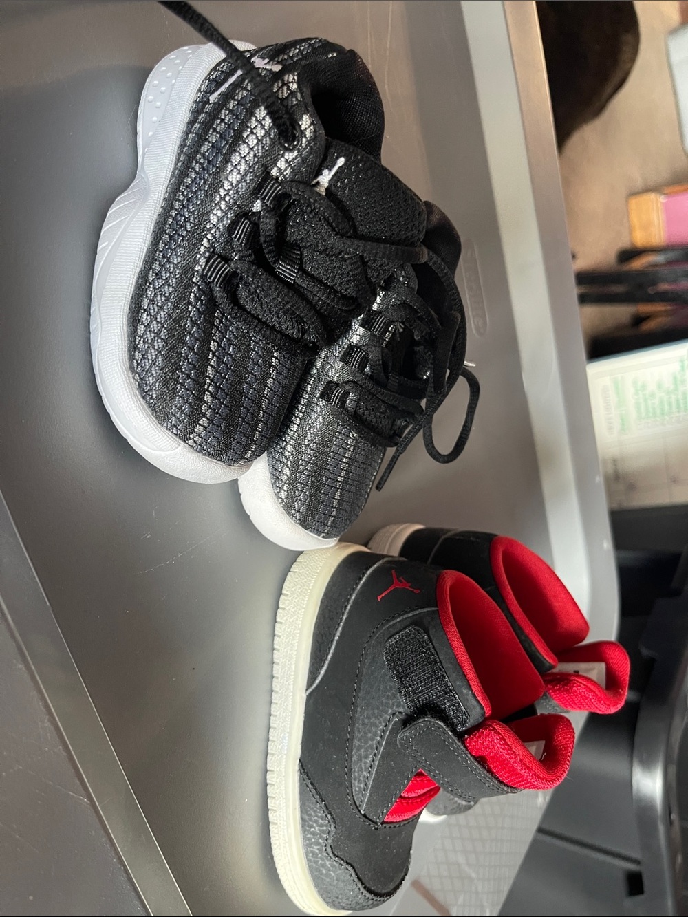 2 pairs of kids Jordans. 4C